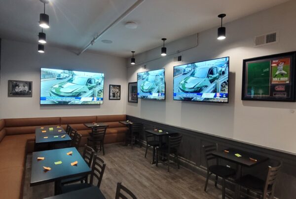 Control4 smart climate control panel in modern office or business setting.