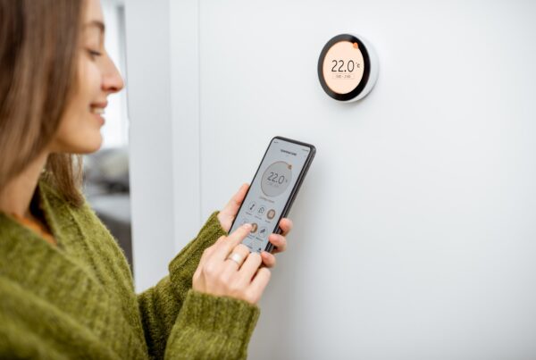 Smart thermostat controlling automated air conditioning system